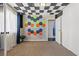 Soundproofed bedroom with acoustic tiles and neutral carpet at 1911 Valley Dr, Las Vegas, NV 89108