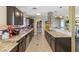 Updated kitchen boasts granite countertops, stainless steel appliances, and ample storage at 1911 Valley Dr, Las Vegas, NV 89108