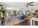 Inviting living space with hardwood floors, comfortable seating, and plenty of natural light at 1911 Valley Dr, Las Vegas, NV 89108