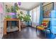 Unique corner of a living area showcasing plants, natural light, and playful decor at 1911 Valley Dr, Las Vegas, NV 89108