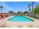 Inviting pool with sunning patio and colorful mural at 1911 Valley Dr, Las Vegas, NV 89108