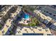 Aerial shot of the apartment complex, highlighting lush greenery, well-maintained buildings, and refreshing pool at 2016 Mesquite Ln # 104, Laughlin, NV 89029