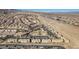 Overhead shot of condos in a desert community, easy parking, with views of highways and mountains at 2016 Mesquite Ln # 104, Laughlin, NV 89029