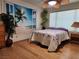Relaxing bedroom featuring a floral bedspread and faux beach scene at 2016 Mesquite Ln # 104, Laughlin, NV 89029