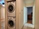 Convenient laundry area featuring a stacked washer and dryer at 2016 Mesquite Ln # 104, Laughlin, NV 89029