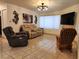 Comfortable living room with tile floors, fireplace and contemporary decor at 2016 Mesquite Ln # 104, Laughlin, NV 89029