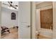 Bathroom features hardwood floors, exercise equipment and a bathroom with shower at 2172 De Rouge Ave, Henderson, NV 89044