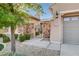 Home exterior with manicured landscaping and an inviting gated entrance at 2172 De Rouge Ave, Henderson, NV 89044