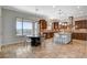 Spacious kitchen with stainless steel appliances, large island, and adjacent breakfast nook at 2172 De Rouge Ave, Henderson, NV 89044
