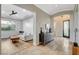 Elegant living room featuring wood floors, coffered ceilings and seamless transition to the entry way at 2172 De Rouge Ave, Henderson, NV 89044