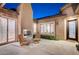 Cozy outdoor patio with modern fireplace, seating, and stylish design, perfect for relaxing at 2172 De Rouge Ave, Henderson, NV 89044