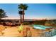 Tranquil pool and spa area with lounge chairs and scenic views at 2172 De Rouge Ave, Henderson, NV 89044