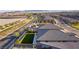 Aerial view showcasing a home, manicured lawn, and a residential neighborhood at 218 Vista Balla Ave, Las Vegas, NV 89138