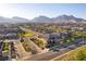 Scenic community view with well-maintained homes and mountain backdrop at 218 Vista Balla Ave, Las Vegas, NV 89138