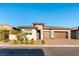 Attractive single-story home featuring a brick driveway and well-maintained landscaping at 218 Vista Balla Ave, Las Vegas, NV 89138