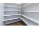 Walk-in pantry with white shelving on all sides, offering ample storage space at 218 Vista Balla Ave, Las Vegas, NV 89138