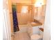 Traditional bathroom featuring tiled walls, a tub and shower combo, and a vanity with countertop at 2813 Willoughby Ave, Las Vegas, NV 89101