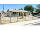 Modest single story home with xeriscaped yard and chain link fence at 2813 Willoughby Ave, Las Vegas, NV 89101