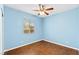 Comfortable bedroom with ceiling fan and natural light at 3012 Chiefs Ct, North Las Vegas, NV 89032
