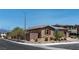 View of desert landscaping surrounding this charming single-story home on a sunny day at 3012 Chiefs Ct, North Las Vegas, NV 89032