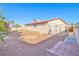 The spacious backyard includes a small storage shed, a patio, and drought-resistant gravel landscape at 304 Perkins Cir, Las Vegas, NV 89106
