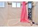 Bathtub featuring tiled walls, a pink shower curtain, and rain shower system at 304 Perkins Cir, Las Vegas, NV 89106