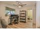 Guest bedroom featuring dual monitors with rolling chair and exercise equipment at 304 Perkins Cir, Las Vegas, NV 89106