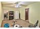 This spacious bonus room features carpet flooring and access to a laundry room at 304 Perkins Cir, Las Vegas, NV 89106