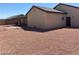 Spacious backyard with gravel and covered patio area, perfect for outdoor entertaining at 31 White Burch Ln, Pahrump, NV 89048