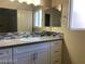 Bathroom featuring updated vanity with ample counter space and designer tile at 31 White Burch Ln, Pahrump, NV 89048