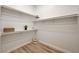 Bright closet with wood plank floors and white walls and shelving at 3218 Squire St, Las Vegas, NV 89135
