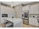 Modern kitchen featuring a large island with bar seating and stainless steel appliances at 3218 Squire St, Las Vegas, NV 89135