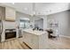 Open-concept kitchen featuring a large island, stainless appliances, and a breakfast nook at 3218 Squire St, Las Vegas, NV 89135
