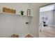Functional laundry room, offering convenient access to the kitchen and dining area at 3218 Squire St, Las Vegas, NV 89135
