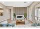 Bright living room featuring fireplace and seamless open-concept design at 3218 Squire St, Las Vegas, NV 89135