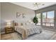 Bedroom featuring natural light, decor, a large bed, and modern decor at 3218 Squire St, Las Vegas, NV 89135