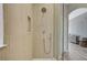 Shower featuring rain head, niche, and wood plank design with light colored grout at 3218 Squire St, Las Vegas, NV 89135