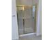 Bathroom showcasing a glass-enclosed shower with gold trim and hardware at 3328 White Bark Pine St, Las Vegas, NV 89129