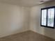 Neutral bedroom with window and shutter with natural light and empty space at 3328 White Bark Pine St, Las Vegas, NV 89129