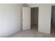 Carpeted bedroom featuring a closet and ensuite entrance at 3328 White Bark Pine St, Las Vegas, NV 89129