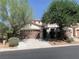 Charming two-story home with two-car garage and mature landscaping at 3328 White Bark Pine St, Las Vegas, NV 89129