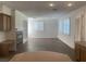 Spacious living room boasts a cozy fireplace and built-in workstation at 3328 White Bark Pine St, Las Vegas, NV 89129