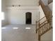 Spacious living room with staircase and abundant natural light at 3328 White Bark Pine St, Las Vegas, NV 89129