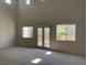 The home features an open living room plan and large windows at 3328 White Bark Pine St, Las Vegas, NV 89129