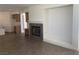 Cozy living room with tile floors, built-ins, and a fireplace at 3328 White Bark Pine St, Las Vegas, NV 89129