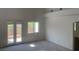 Living room features bright windows and access to the outdoor area at 3328 White Bark Pine St, Las Vegas, NV 89129