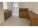 Dedicated carpeted office space featuring cabinets, drawers, and a desk at 3328 White Bark Pine St, Las Vegas, NV 89129
