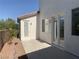 Private patio area with access to the home and a storage shed at 3328 White Bark Pine St, Las Vegas, NV 89129