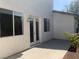 This is a view of the patio area with windows into the house at 3328 White Bark Pine St, Las Vegas, NV 89129
