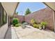 Enclosed courtyard with patio furniture and mature plantings at 3380 Kensbrook St, Las Vegas, NV 89121